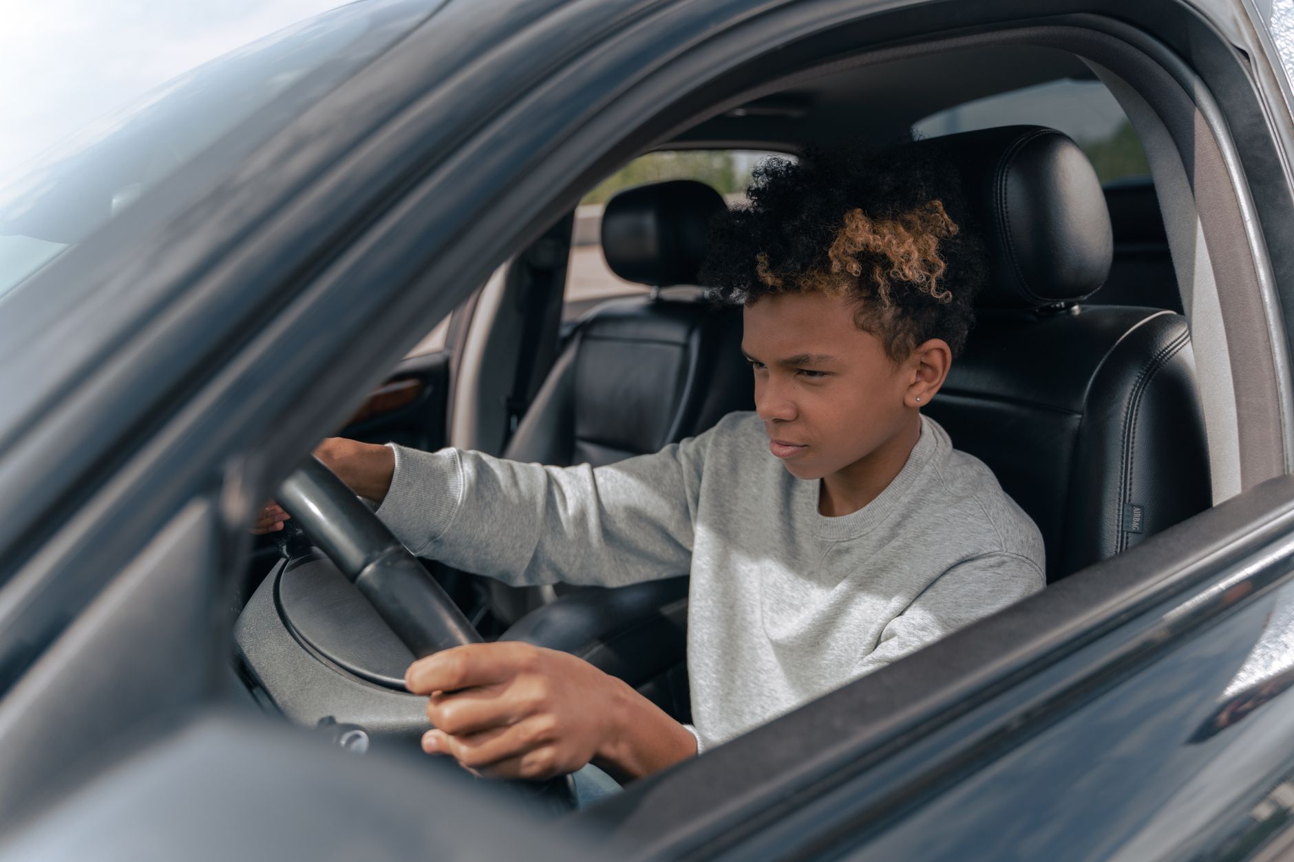 Learner driver taking manual driving lesson relevant to automatic vs manual driving licence UK 2026 choice